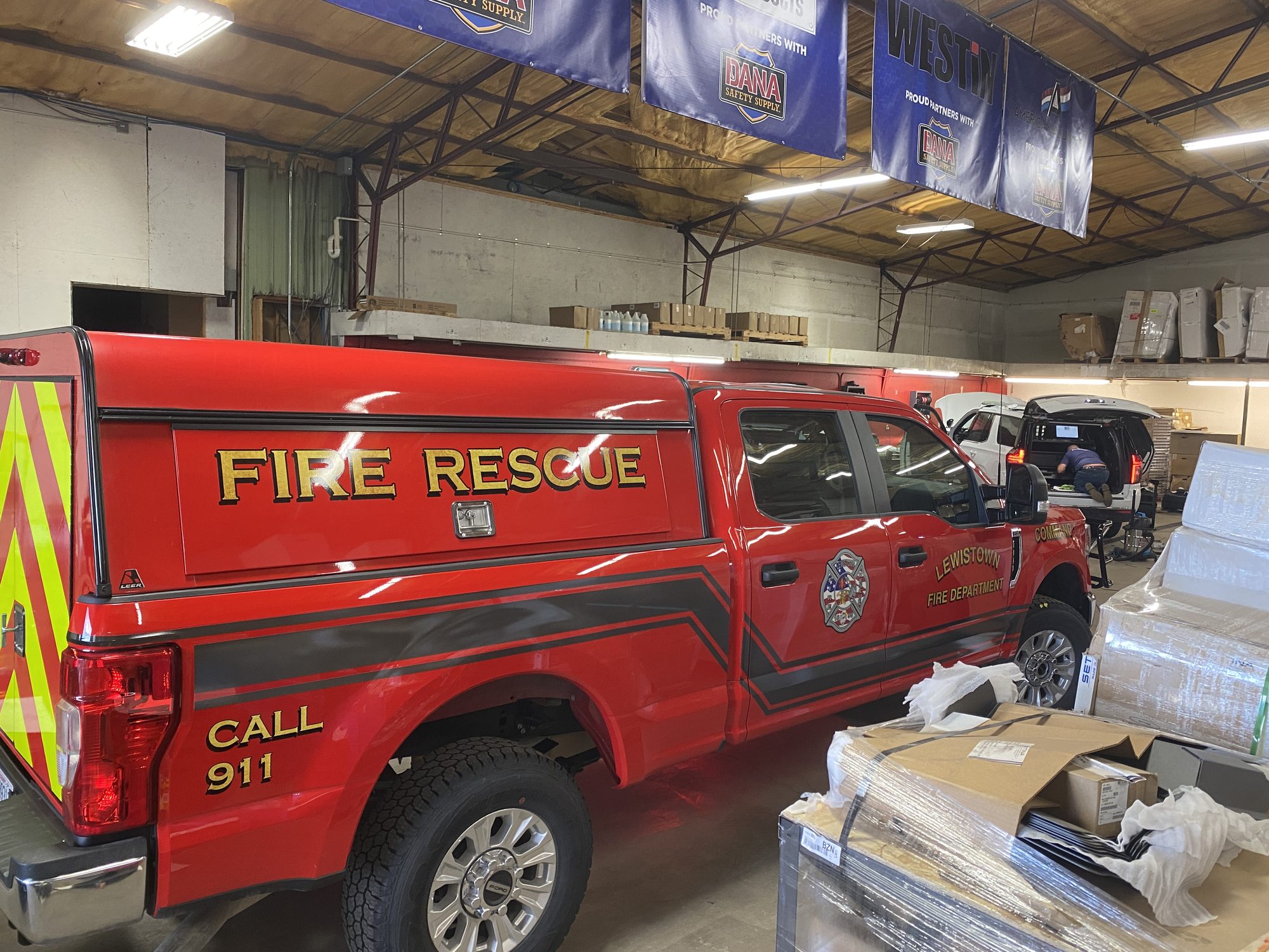 Fire rescue truck with reflective rear chevron striping