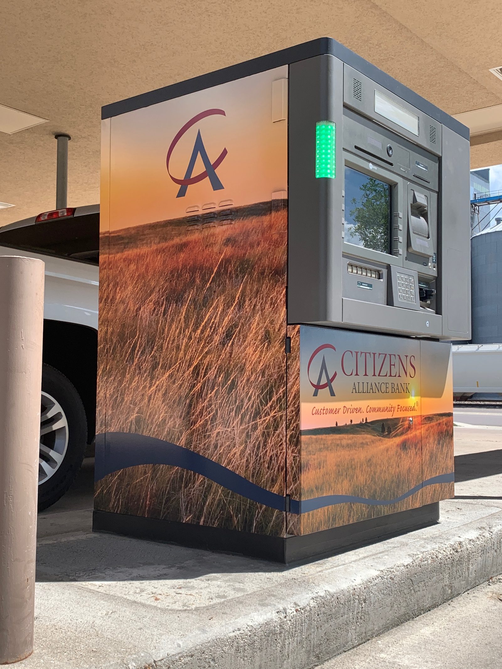 Wrapped ATM enclosure with landscape photography