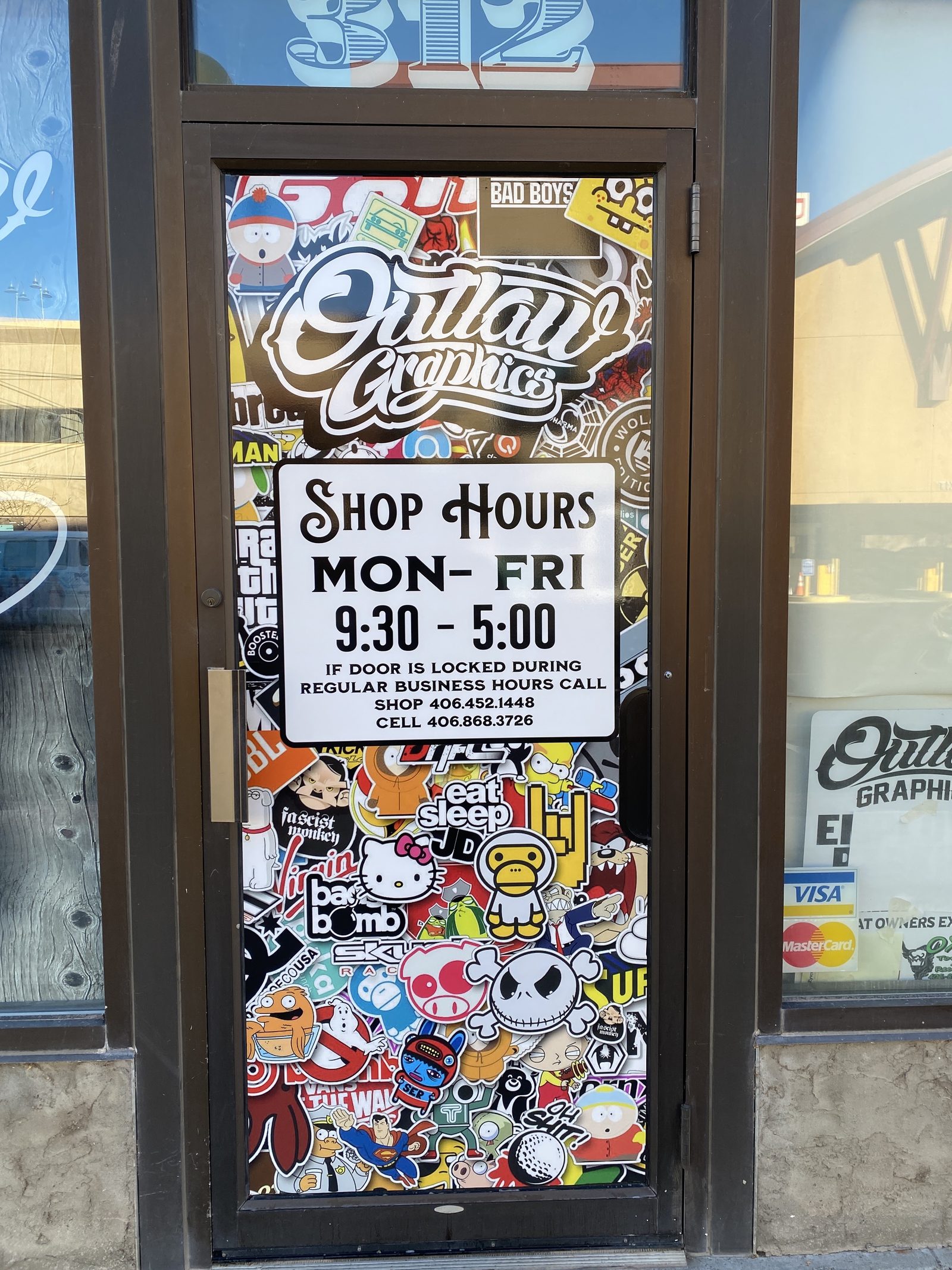 The shop door on 1st Ave S